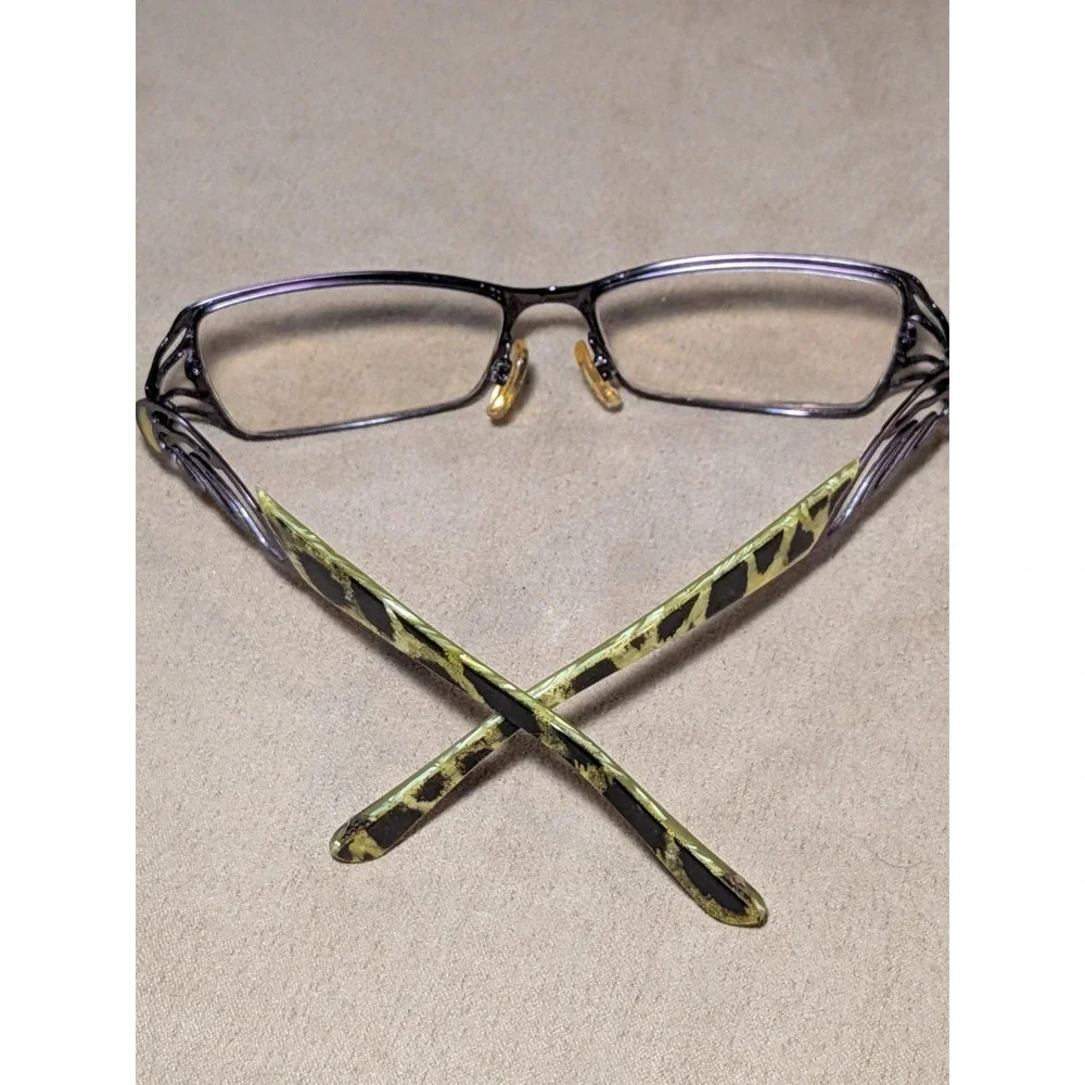 LA MATTA Brille LM3012 col. 3 Purple Metal Wings Green Black Animal Print